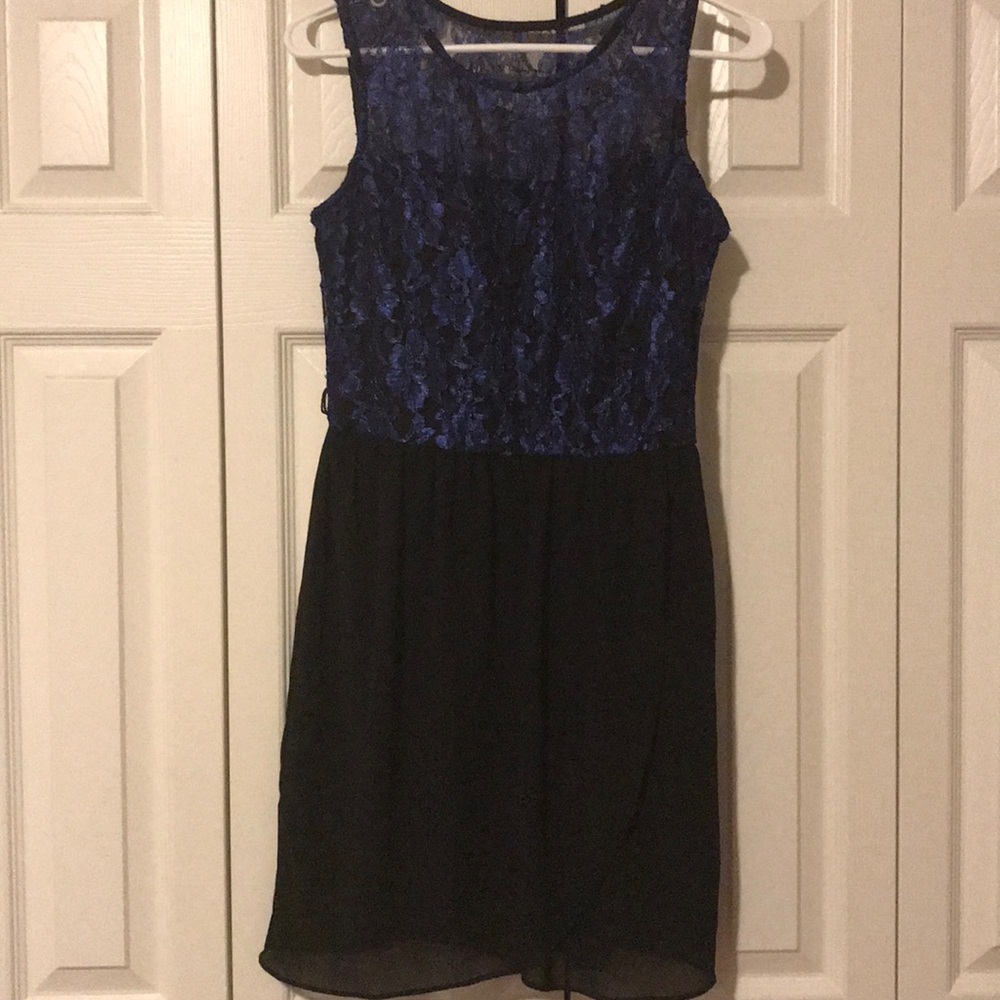 A strapless dress blue on the top, black on bottom